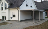 Carport mit einem Geräteschuppen aus BSH Holz mit Fundamenten – in Detmold